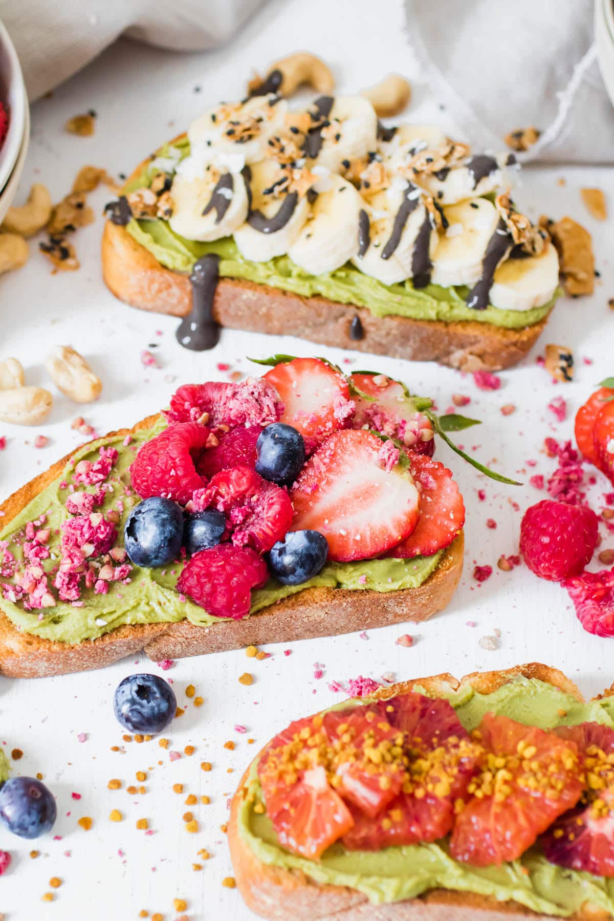 Matcha Collagen Cashew Butter on toast with fruit slices