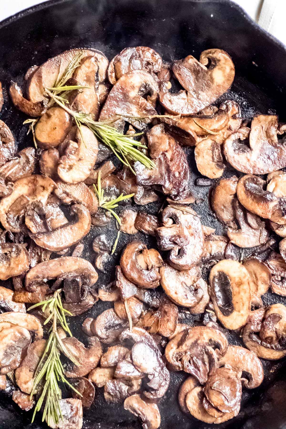 wild Mushrooms in a skillet with herbs