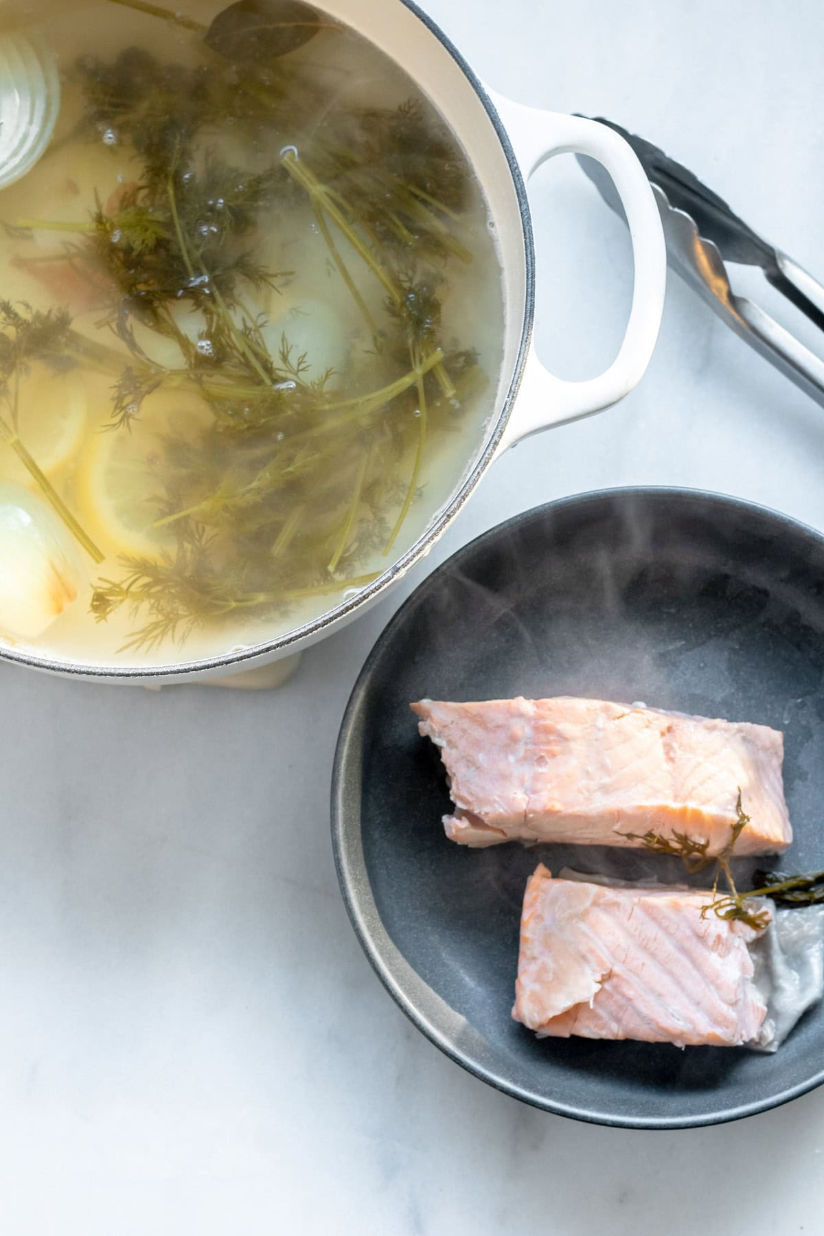 salmon filets and poaching liquid