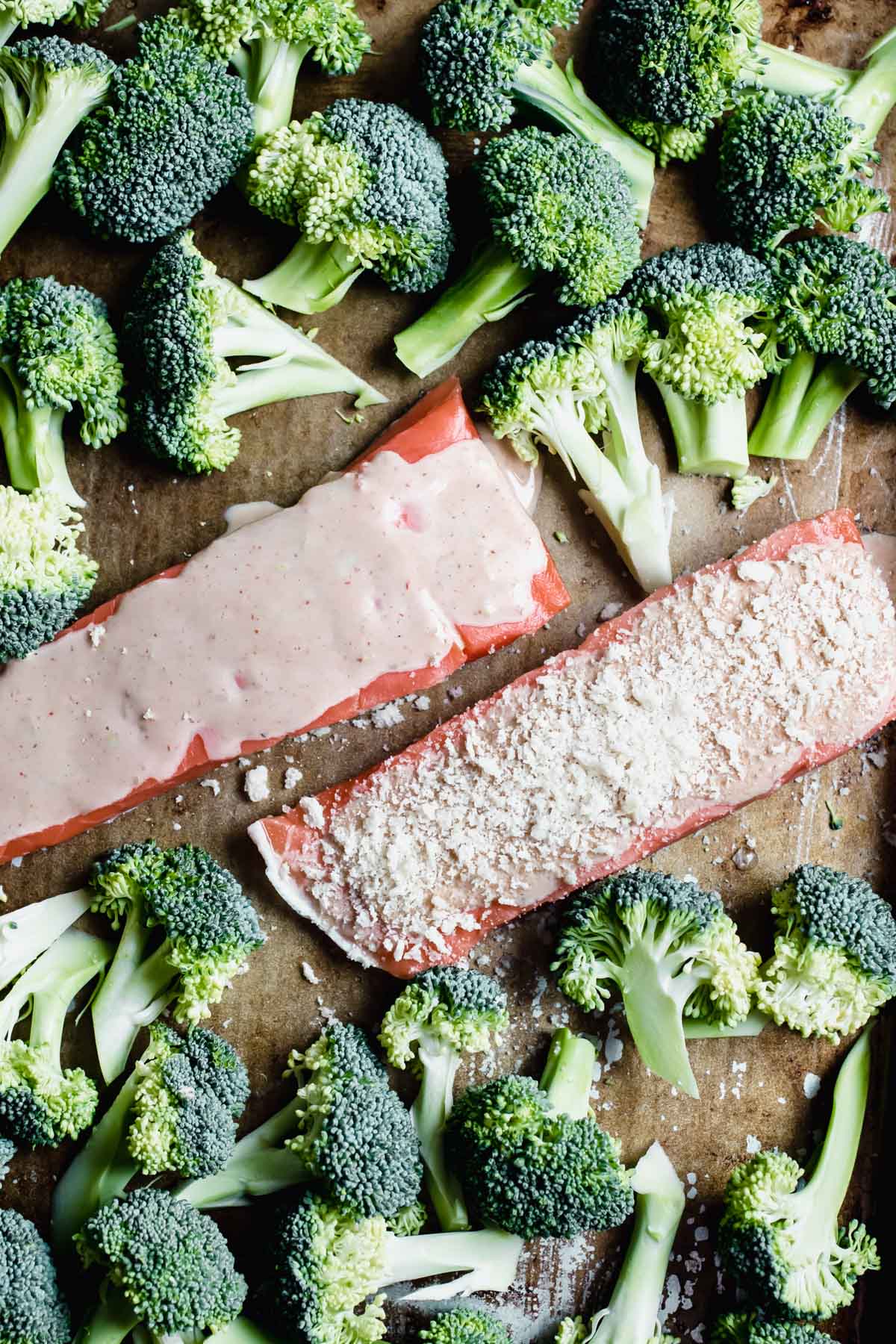 raw broccoli and salmon with coating