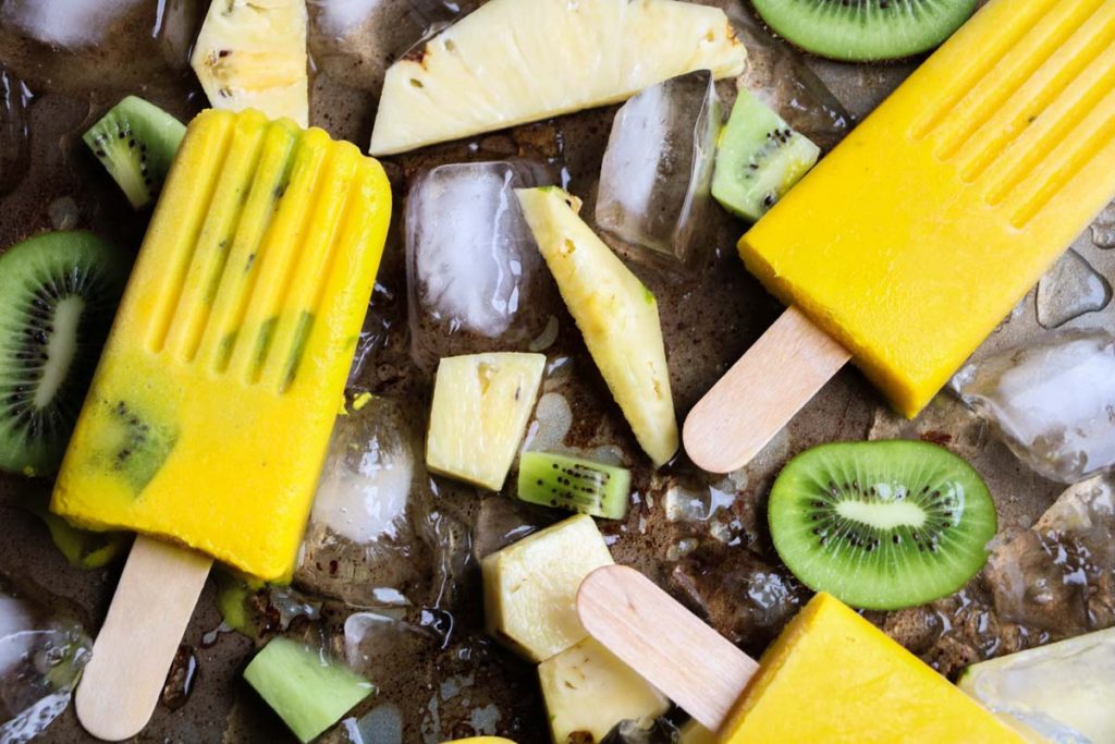 Anti-inflammatory tropical turmeric popsicles. Quick and easy, only 5 ingredients! A frozen treat that is good for you. |abraskitchen.com