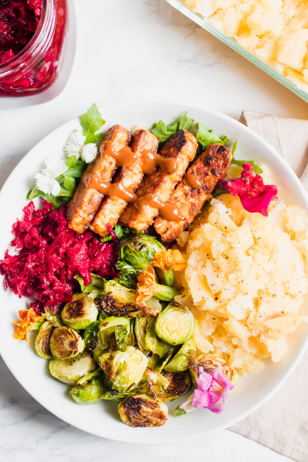 Buttery mashed rutabaga and turnips topped with easy BBQ tempeh, roasted Brussels sprouts, and a sweet and spicy beet relish. This vegan meal prep lunch will have your taste buds doing the happy dance!