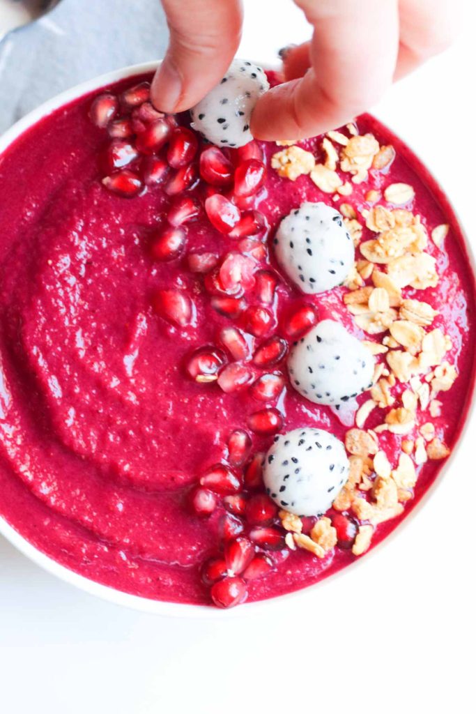 This vegan, gluten-free, beet, pray, love smoothie bowl is the perfect combo of bright red beets and berries, loaded with antioxidants and superfoods. A healthy loving way to begin any day | Abraskitchen.com