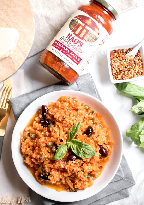 Cauliflower rice puttanesca is a quick and easy healthy meal that is ready in 10 minutes flat! This recipe uses easy healthy pantry staples and is packed with amazing flavor! Friendly for gluten-free, paleo, keto, and vegan.