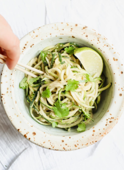A healthy and delicious recipe for cold peanut zucchini noodles. Only 7 simple ingredients, no cooking required! Just whisk together the most delicious wholesome peanut sauce and toss in some zucchini noodles. Gluten free, paleo, vegan, whole 30 healthy lunch, dinner, or quick snack!