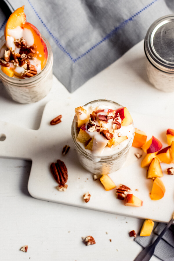 This easy, healthy, and delicious overnight oats recipe is the perfect meal prep breakfast! Creamy vanilla-scented oats swirled with fresh peaches, chia seeds, and collagen peptides for a protein-rich health-supportive breakfast. 
