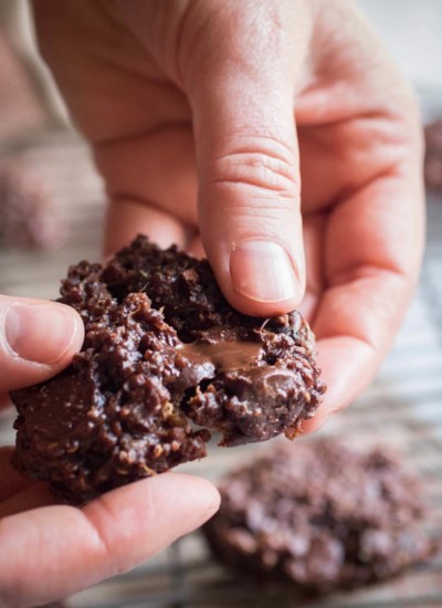 Double Chocolate cherry quinoa cookies are perfectly soft and chewy chocolate cookies with tart dried cherries, almond butter, cooked quinoa, and dates. Gluten free, refined sugar-free, vegan, dairy free, flourless |abraskitchen.com
