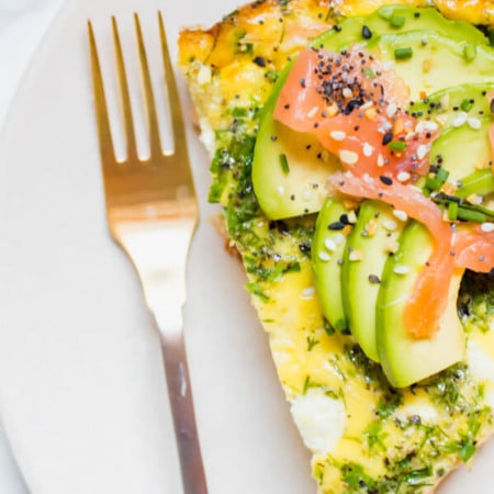 This healthy smoked salmon herb frittata recipe is perfect for brunch or a healthy delicious breakfast all week long. Filled with veggies, fresh herbs, smoked salmon, and goat cheese and topped with avocado and everything but the bagel spice. Naturally gluten free, Keto, Whole 30, and Paleo-friendly recipe.