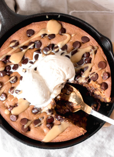 Gooey rich and decadent tahini chocolate chip cookie made in a skillet. A giant cookie that is sure to bring a smile to your face! Real food, gluten-free, no flour, or refined sugar.