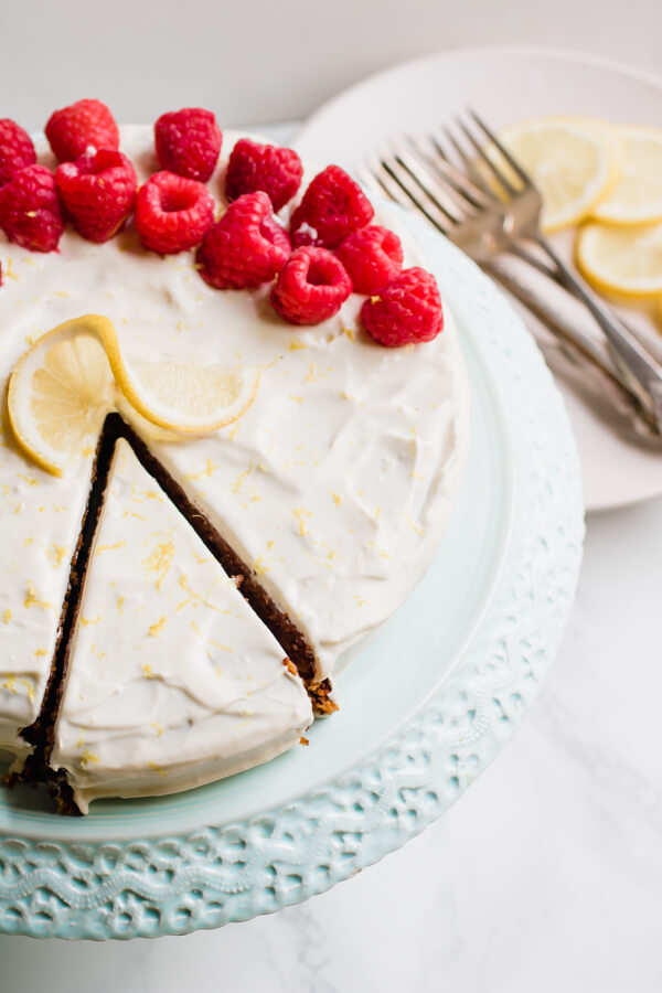 Rich, moist, and delicious gluten-free lemon cake with luscious lemon cream cheese frosting. Naturally gluten-free using a combination of almond and coconut flour and sweetened with coconut palm sugar. 