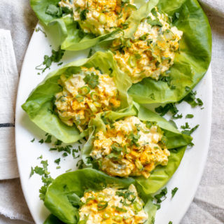 large plate of lettuce cups filled with Healthy Greek Yogurt Egg Salad with Turmeric