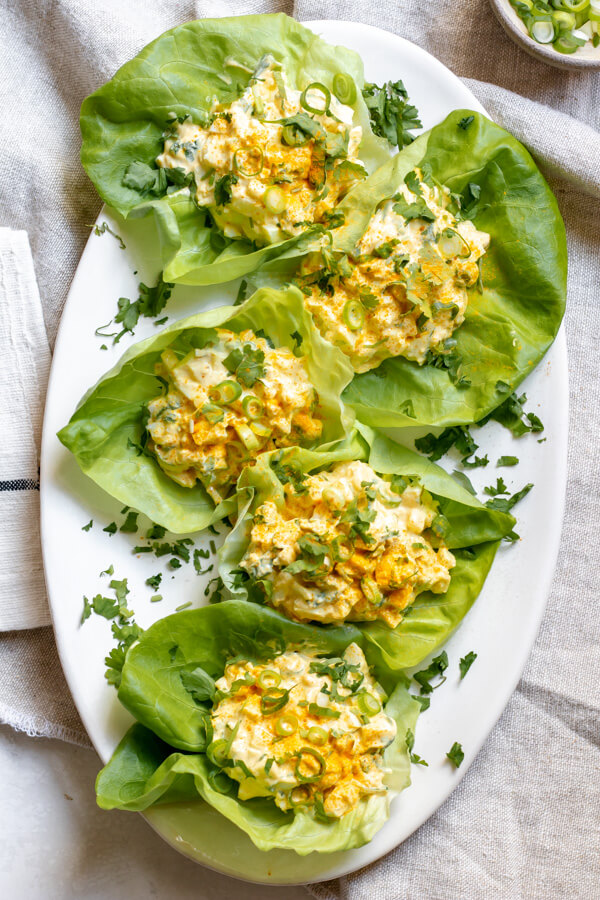 large plate of lettuce cups filled with Healthy Greek Yogurt Egg Salad with Turmeric