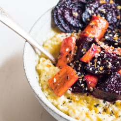 Crispy roasted beets and carrots with everything spice on top of creamy polenta. A healthy delicious quick and easy meal.