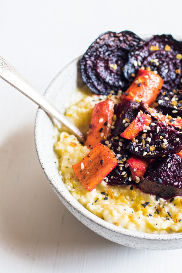 Crispy roasted beets and carrots with everything spice on top of creamy polenta. A healthy delicious quick and easy meal.