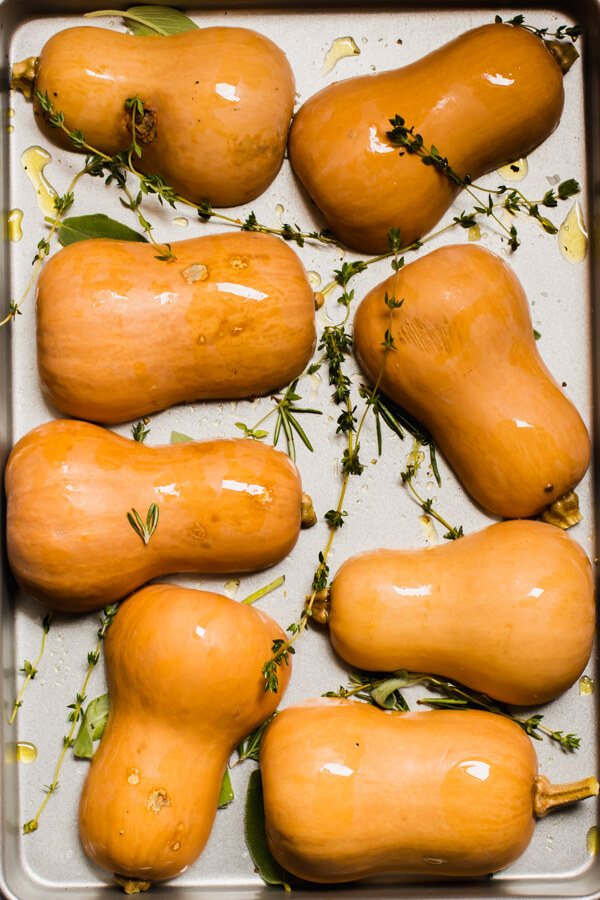 Mouthwatering herb roasted honeynut squash with a miso tahini sauce. Perfect for a quick weeknight meal, or a festive holiday side dish. Gluten-free, vegan, paleo.