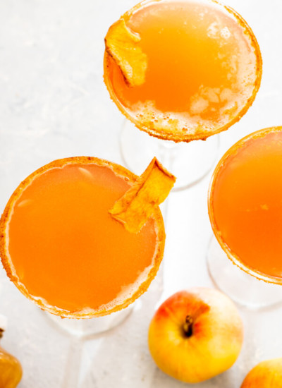 Immune Boosting Apple Cider Elderberry Sparkler in martini glass with garnish
