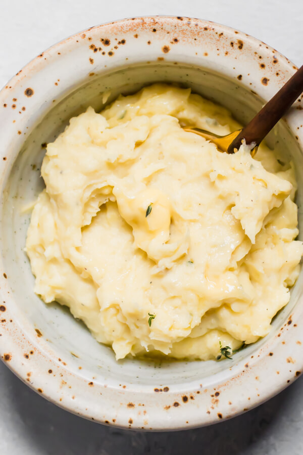 Creamy herbed mashed parsnips and potatoes made quick and easy in the instant pot. The perfect decadent side dish for your holiday table or as a quick and easy side dish any night of the week. 