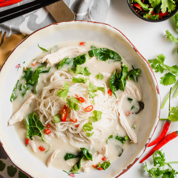 Instant Pot Thai Coconut Lime Chicken Soup with Noodles - A fragrant, warm, fresh and zesty soup that is insanely delicious and super good for you! Start with a whole chicken, fragrant herbs and spices, and thanks to the instant pot, dinner is done in 30 minutes!