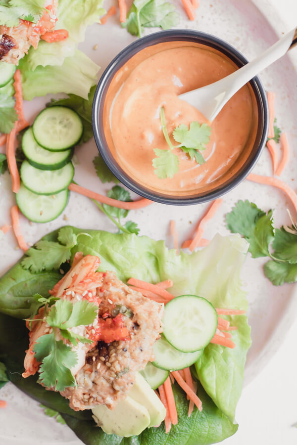Seriously the most flavorful moist turkey burger you have ever had! Piled high in crisp lettuce leaves with carrots, kimchi, avocado, and a special Korean inspired sauce. Perfect for a crowd!
