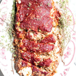 Veggie loaded tender meatloaf stuffed with yummy rich tomato ratatouille and ooey gooey mozzarella cheese. Meatloaf has officially been upgraded.  #meatloaf #glutenfree #healthy |abraskitchen.com