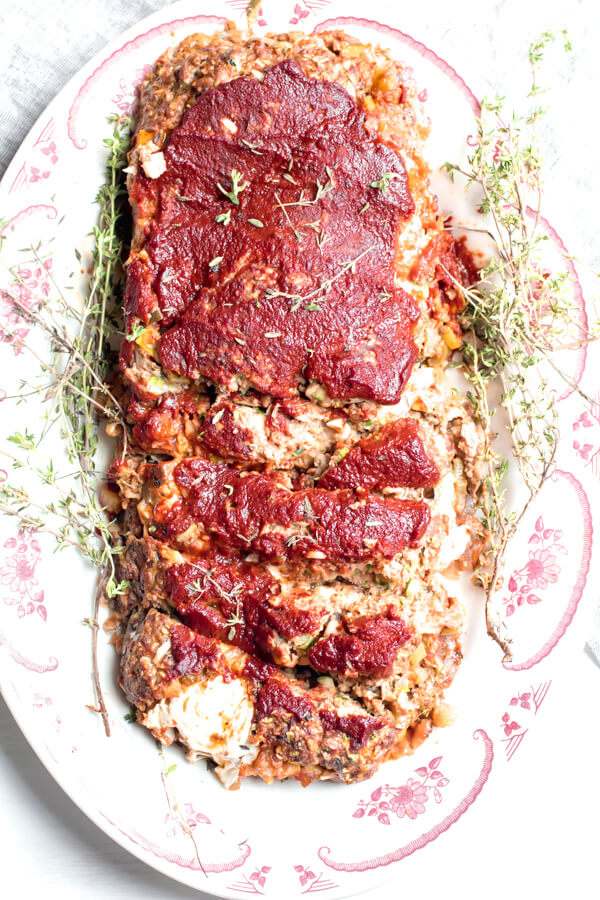 Veggie loaded tender meatloaf stuffed with yummy rich tomato ratatouille and ooey gooey mozzarella cheese. Meatloaf has officially been upgraded.  #meatloaf #glutenfree #healthy |abraskitchen.com