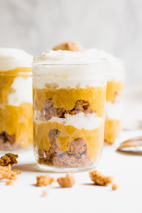Creamy pumpkin mousse layered with spicy gingerbread cookies and whipped coconut cream. No-bake pumpkin pie in a jar. Refined sugar-free, vegan, gluten-free, and paleo and so delicious you will want to make a triple batch and then keep it all for yourself!