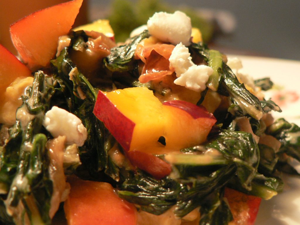 Goat cheese creamed dandelion greens with sweet nectarines is my favorite early summer side dish. Gluten free, liver supportive, and YUMMY!
