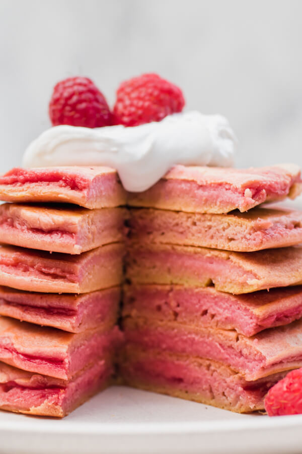 Super healthy real food pancakes, kissed with a touch of shredded beet to create gorgeous festive pink pancakes! Paleo, gluten-free, dairy-free, and so yummy!