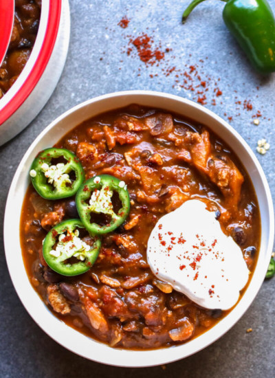 This pumpkin turkey chili recipe is sweet and spicy, the perfect combination of pumpkin, ground turkey, warming spices, and lots of black beans. Yum!