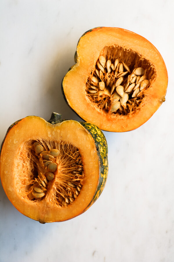 Perfectly roasted seeds from acorn, butternut, spaghetti, or delicata squash. Salty, crunchy, spicy and addictively delicious. Also full of nutrients and minerals! |abraskitchen.com #roastedseeds #pumpkinseeds 