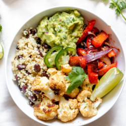 Spicy Cauliflower Burrito Bowl with toppings