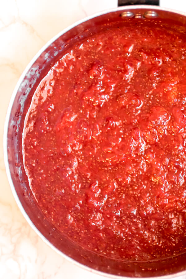 You aren't going to believe how easy it is to make this superfood strawberry chia seed jam. Three ingredients, 10 minutes, and you have a super healthy, sweet and luscious homemade jam that is thickened with chia seeds, instead of a boatload of sugar. This is the ultimate quick and easy real food recipe.