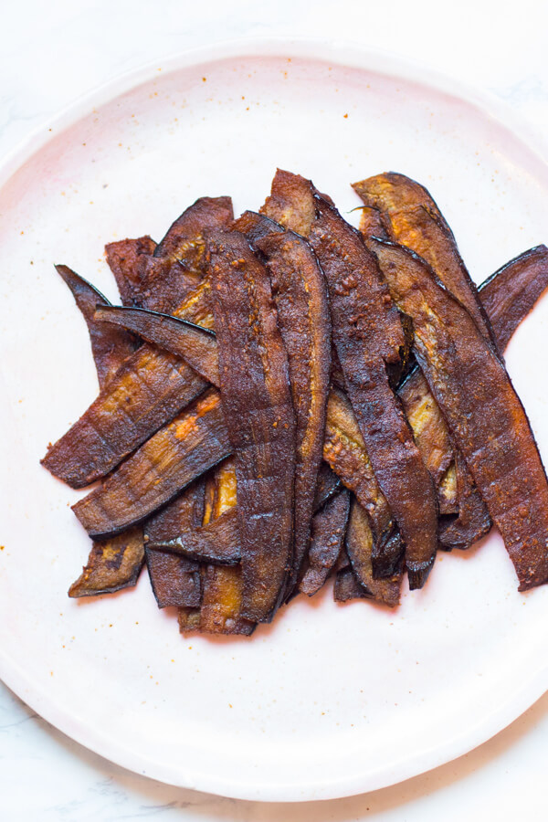 Sweet and salty crisp vegan bacon made with eggplant. A plant-based alternative to bacon, no liquid smoke needed | abraskitchen.com