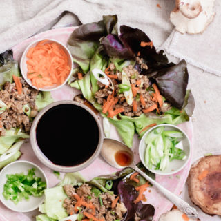 Teriyaki Turkey and Shiitake Mushroom Lettuce Wraps. Ground turkey is cooked to perfection with finely diced shiitake mushrooms and teriyaki sauce. Served in crunchy lettuce wraps with carrots, scallions, and diced jalapeno. Perfect for meal prep! A healthy paleo, gluten-free, grain-free, dairy-free recipe to add to your repertoire.