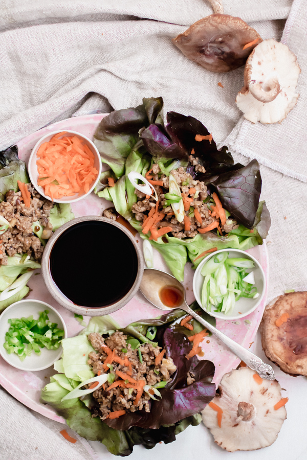Teriyaki Turkey and Shiitake Mushroom Lettuce Wraps. Ground turkey is cooked to perfection with finely diced shiitake mushrooms and teriyaki sauce. Served in crunchy lettuce wraps with carrots, scallions, and diced jalapeno. Perfect for meal prep! A healthy paleo, gluten-free, grain-free, dairy-free recipe to add to your repertoire.