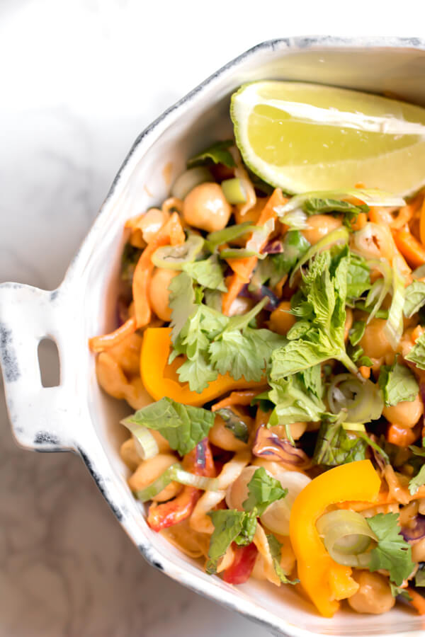 Healthy Thai Chickpea Jar Salad is the perfect meal prep lunch, this recipe makes 4 days of crazy town delicious protein-rich lunches! Creamy spicy peanut butter dressing with chickpeas, crunchy vegetables, cilantro, and salted peanuts. You have to put this on your meal plan!
