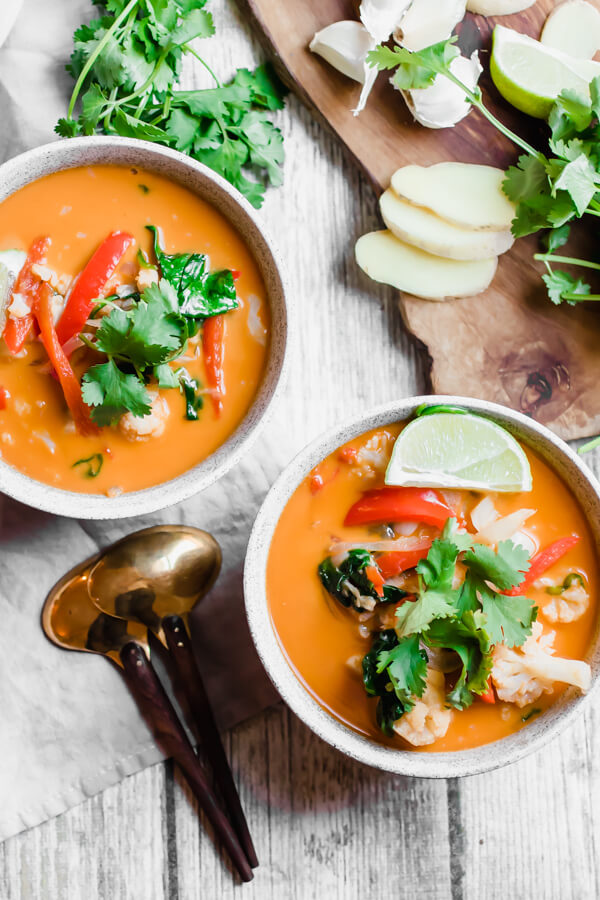 Thai Red Vegetable Curry ready in 30 minutes! A super healthy vegan, gluten-free, dairy-free, paleo meal loaded with good for you vegetables, Thai spices, and creamy coconut milk.