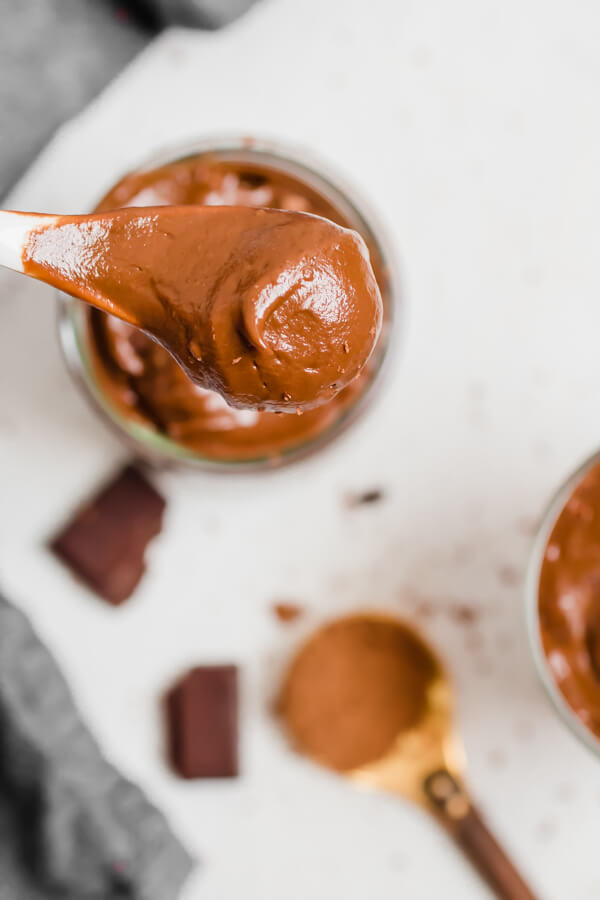 Rich and creamy chocolate avocado pudding, 4 simple wholesome ingredients and 2 minutes to make! You won't believe how easy and decadent this healthy recipe is, kid-friendly and adult approved.