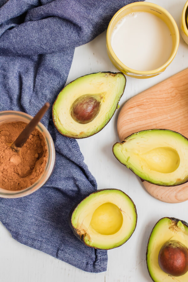 Rich and creamy chocolate avocado pudding, 4 simple wholesome ingredients and 2 minutes to make! You won't believe how easy and decadent this healthy recipe is, kid-friendly and adult approved.