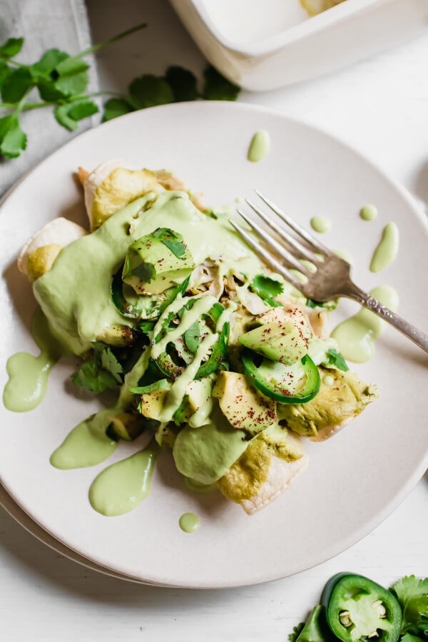 Easy Vegan Brussels Sprout and Mushroom Enchiladas with a creamy green enchilada sauce. A healthy homemade meal bursting with flavor your whole family will love!Â 