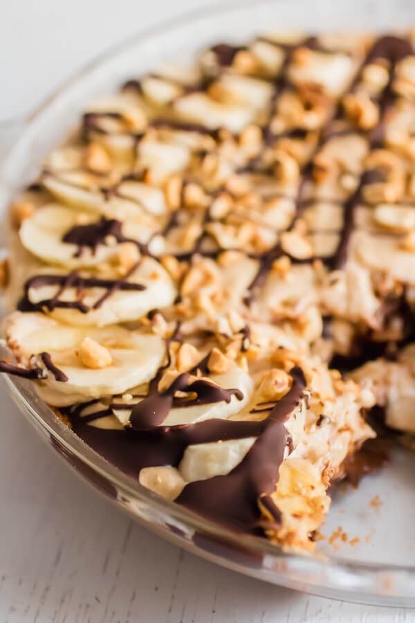 Creamy whipped peanut butter mousse piled high on top of sliced bananas and decadent chocolate avocado mousse, all nestled inside a graham cracker crust. The best peanut butter pie ever!