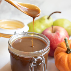 This silky, creamy, vegan pumpkin caramel sauce recipe is the perfect centerpiece for a DIY healthy caramel apple station. Learn how to make this easy fall caramel and get creative with your own caramel apple station!
