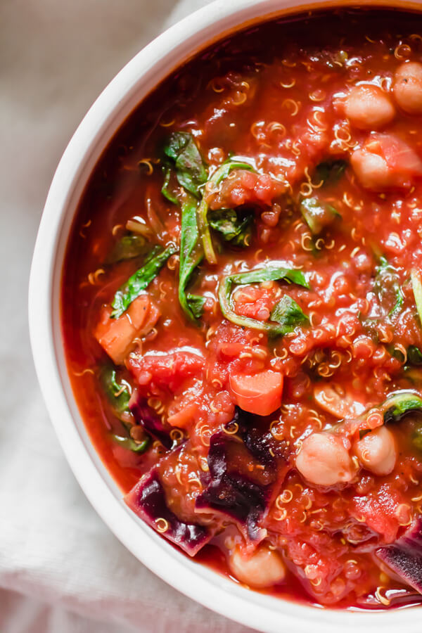 This hearty vegetarian red cabbage quinoa stew is loaded with good for you vegetables that are sauteed with a hefty dose of anti-inflammatory turmeric and then finished with fresh lemon juice. It's zesty, warm, comforting, and delicious!