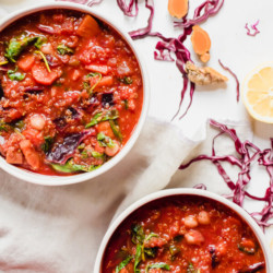 This hearty vegetarian red cabbage quinoa stew is loaded with good for you vegetables that are sauteed with a hefty dose of anti-inflammatory turmeric and then finished with fresh lemon juice. It's zesty, warm, comforting, and delicious!