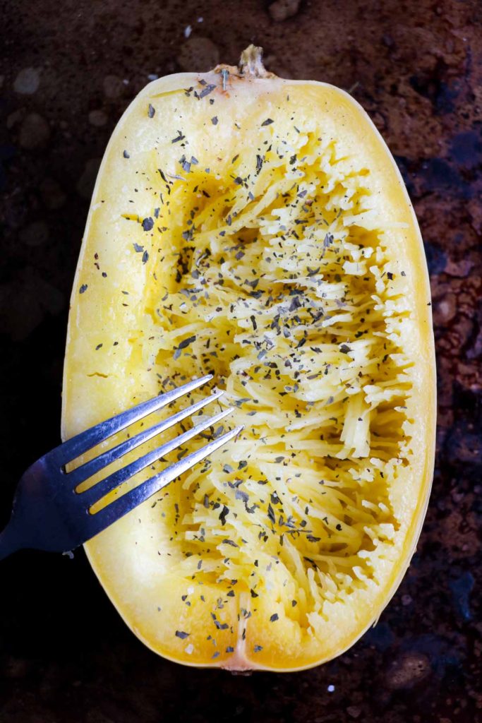 Veggie Parmesan Spaghetti Squash Bowls. Lightly almond flour breaded zucchini and eggplant piled high inside spaghetti squash. Covered in fresh marinara sauce, mozzarella, and Parmesan cheese. YUM! Gluten free, vegetarian |abraskitchen.com
