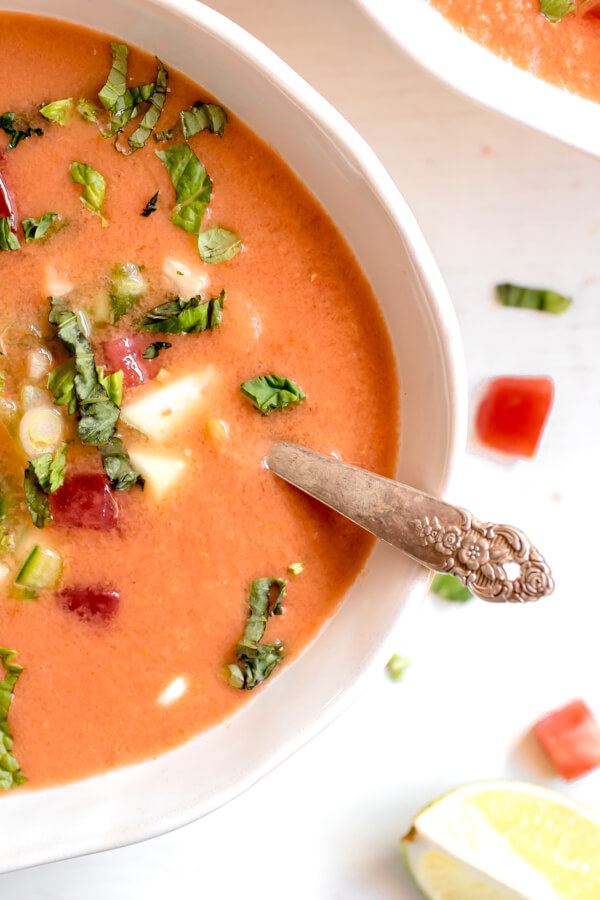 A light and refreshing chilled summer soup, savory with a touch of sweetness from the watermelon. Watermelon, tomatoes, cucumber, jalapeno, scallions, and fresh herbs are the stars of this healthy soup!