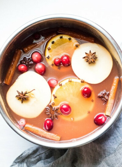 Curl up with a warm mug of this perfectly sweet and spicy mulled cranberry apple cider. One sip and you will see why this should be the official beverage of the season.